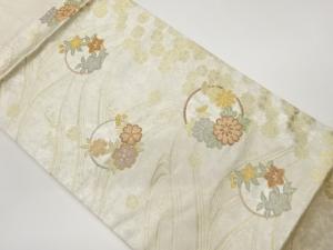 荒波に丸文・花々模様織出し名古屋帯